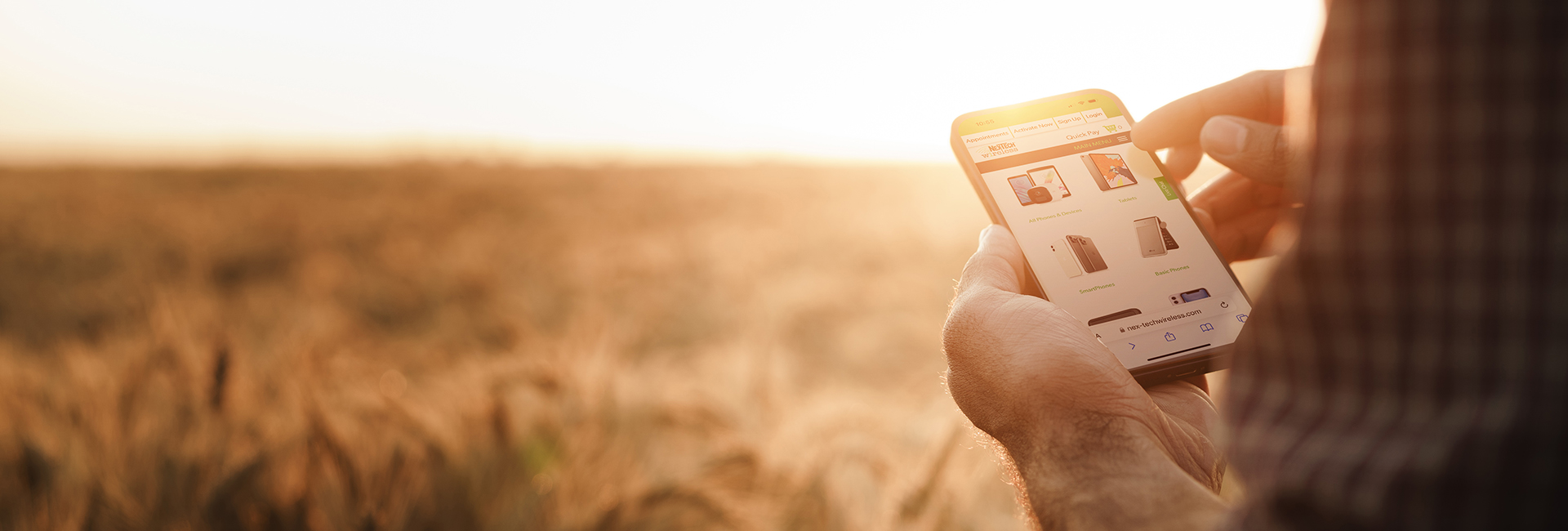 farmer using phone in field